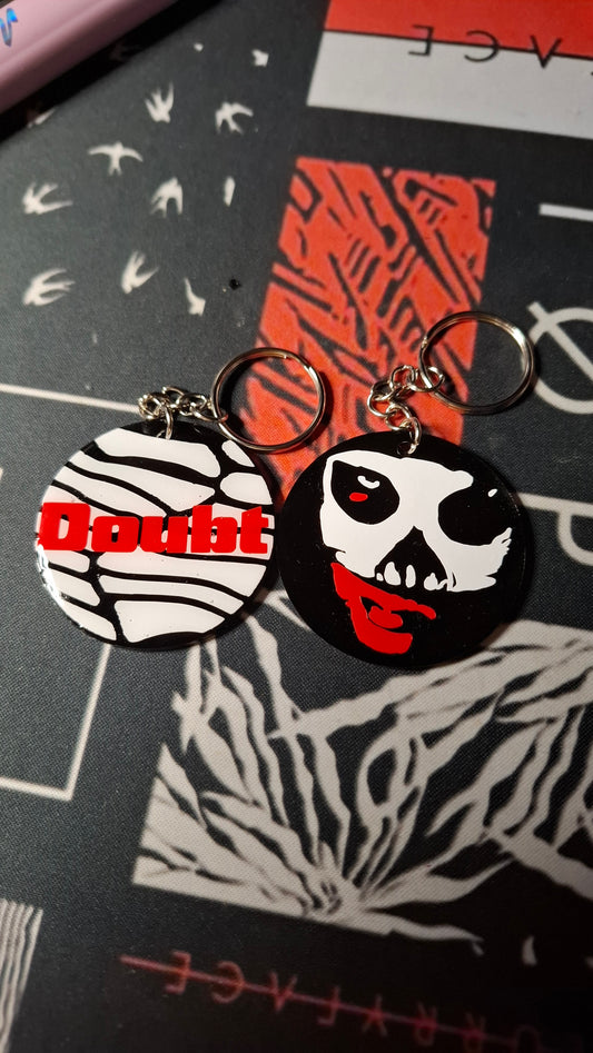 Twenty one pilots Doubt sleutelhanger rond with tick plastic layer