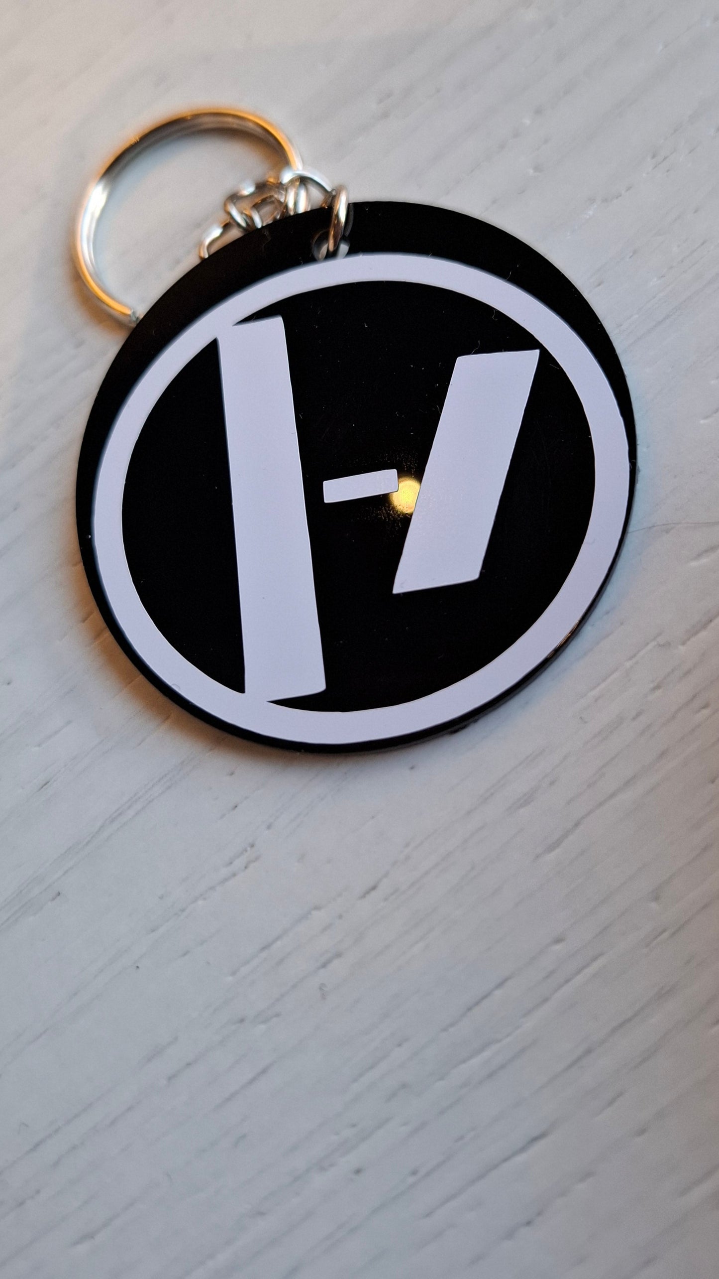 Twenty one pilots the line sleutelhanger rond