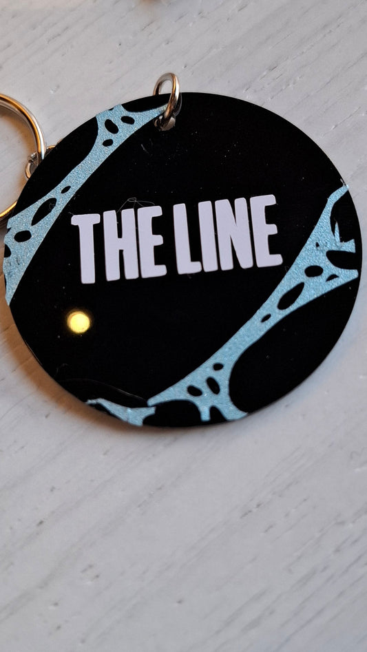Twenty one pilots the line sleutelhanger rond