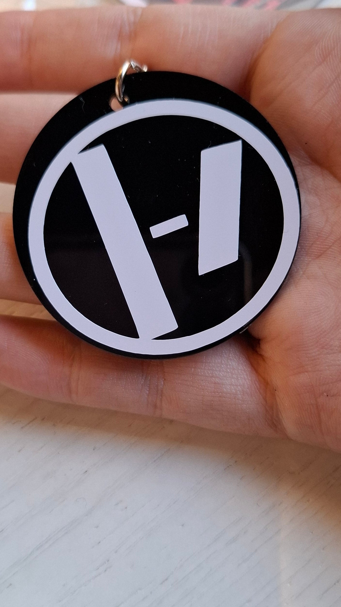 Twenty one pilots the line sleutelhanger rond